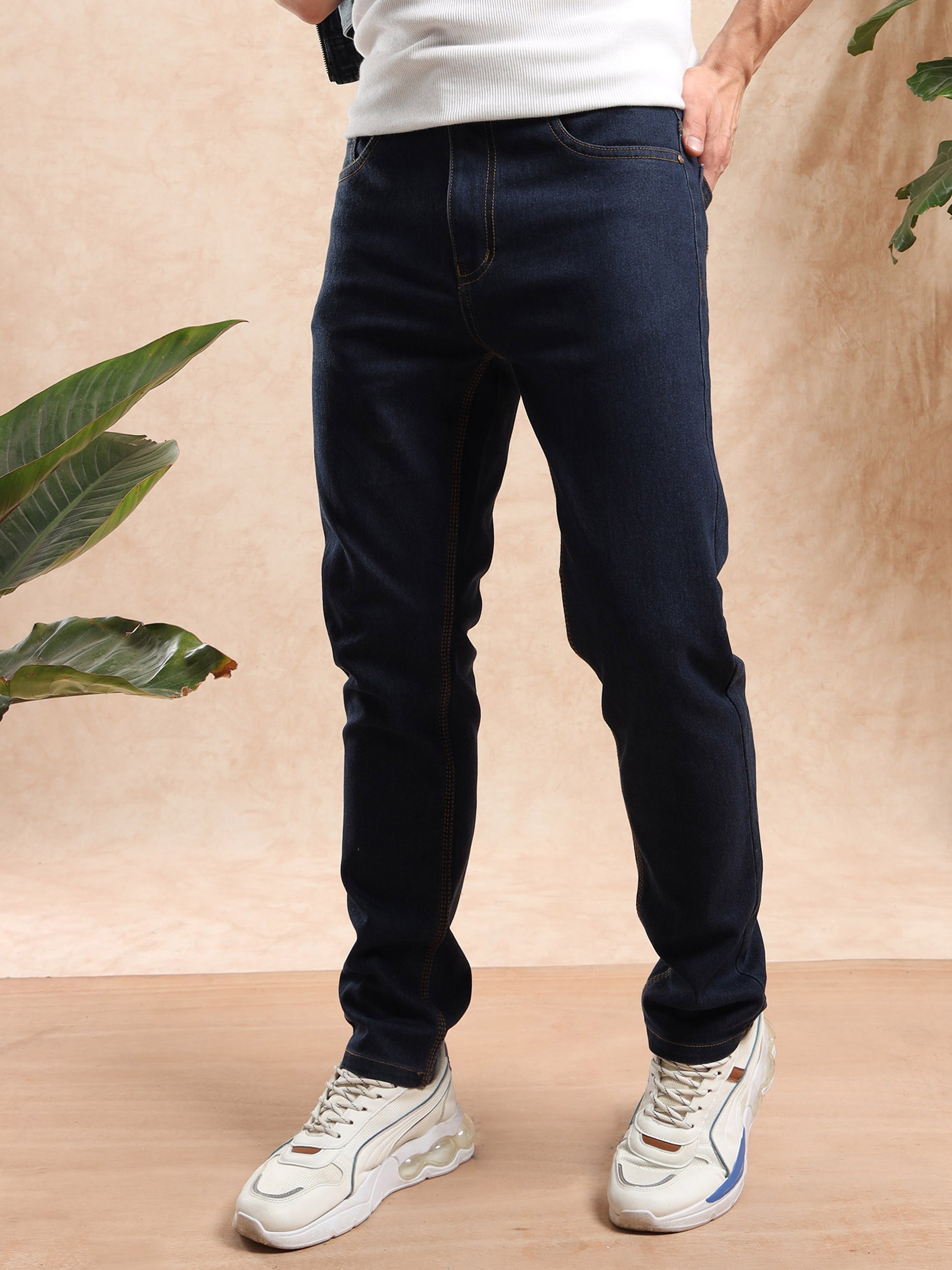 a slim fit men’s dark wash jeans with pockets