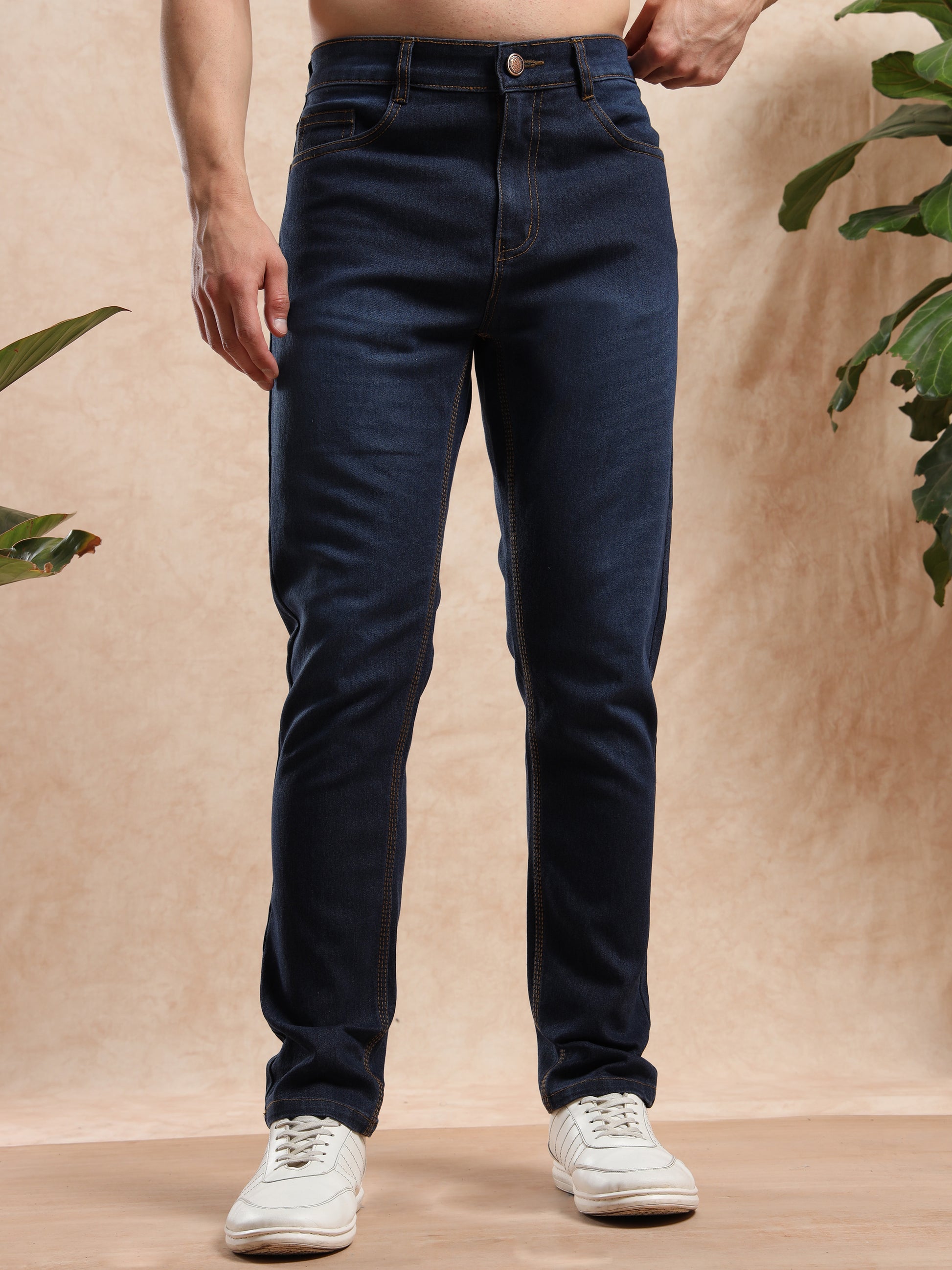 Men’s slim fit dark blue denim jeans paired