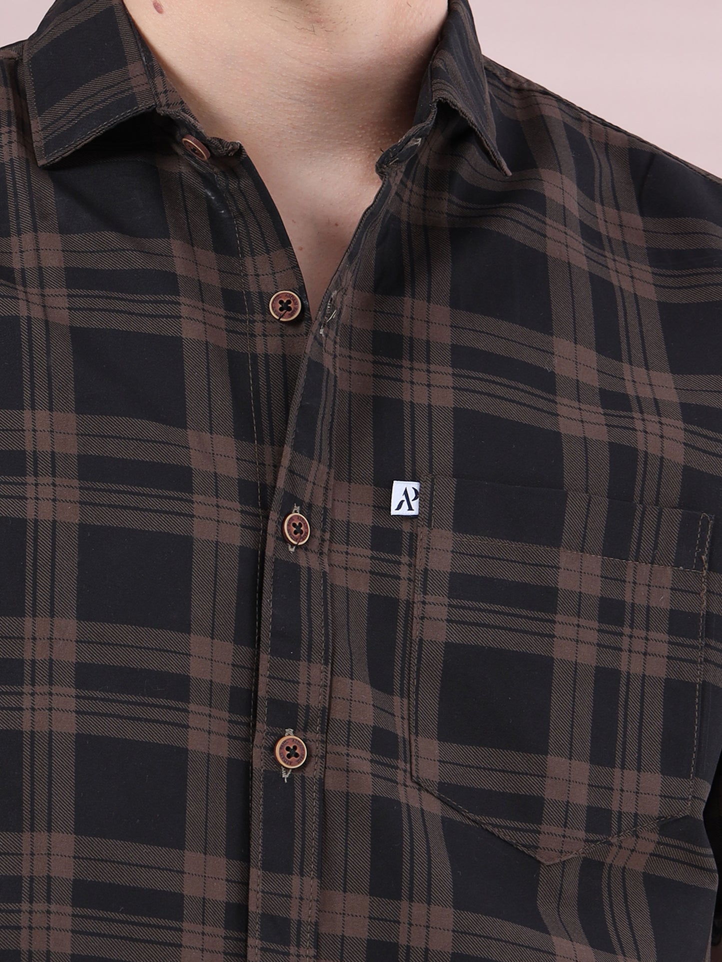 men’s brown and black checked cotton fabric with button placket.