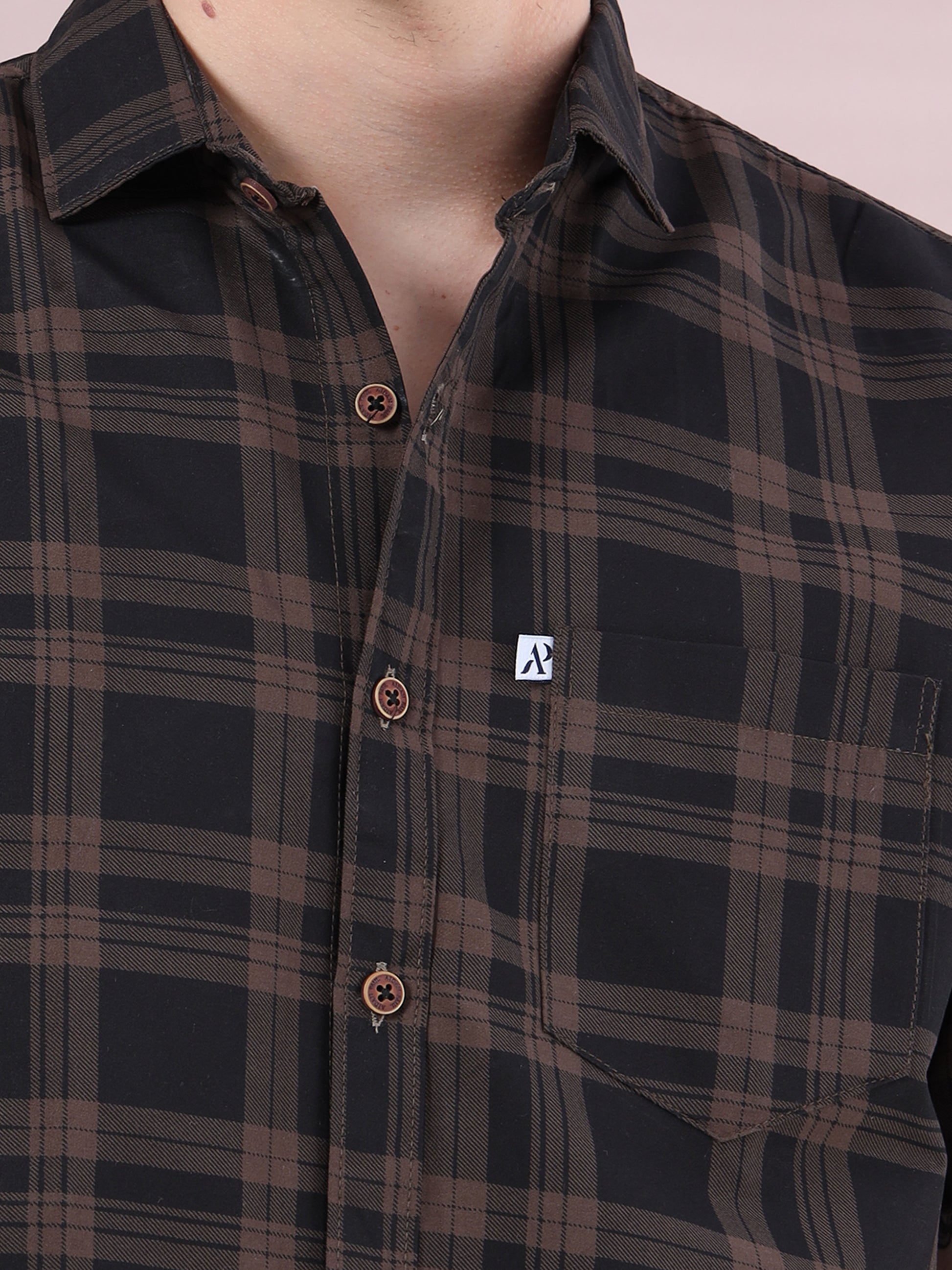 men’s brown and black checked cotton fabric with button placket.