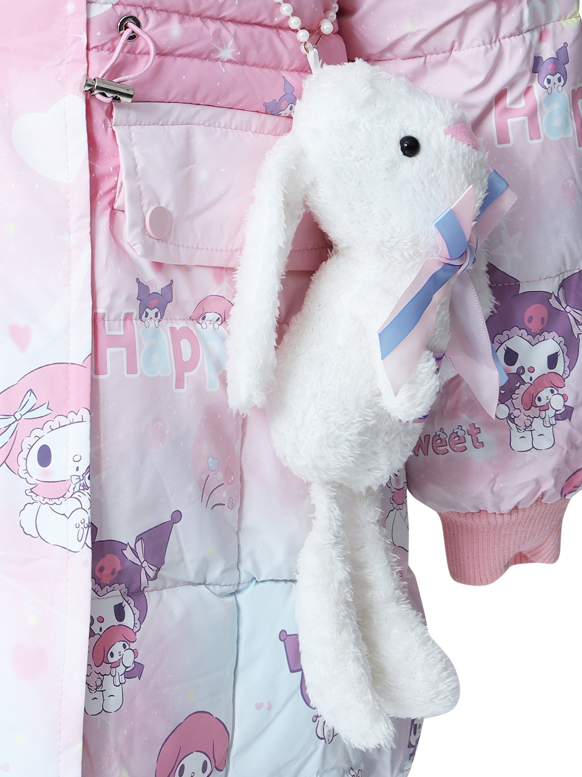 Close-up of a plush white bunny bag with a pink and blue ribbon, hanging from a pearl strap on a light pink puffer jacket