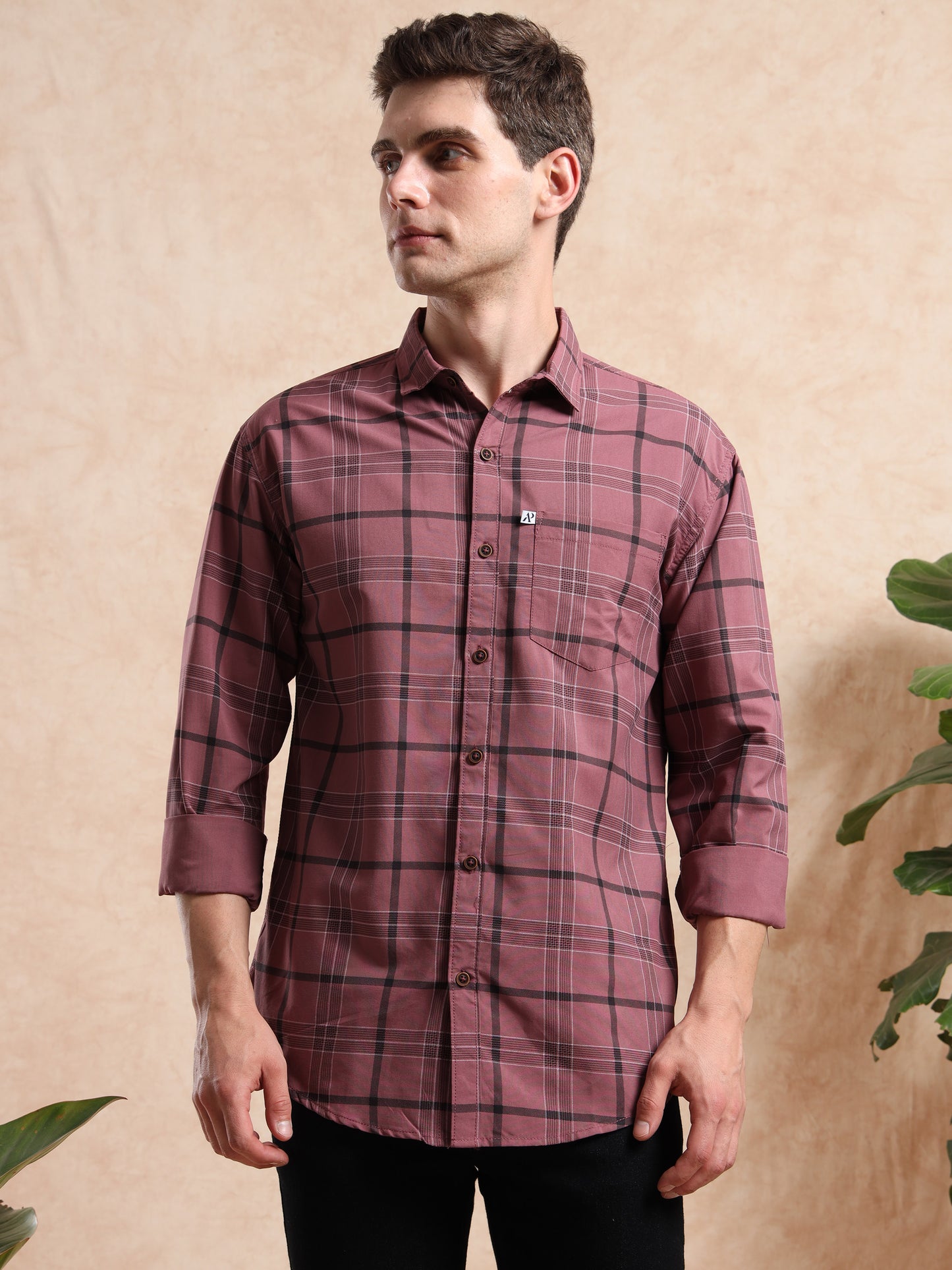 Maroon and black checkered men’s casual shirt with full sleeves, styled with a classic collar