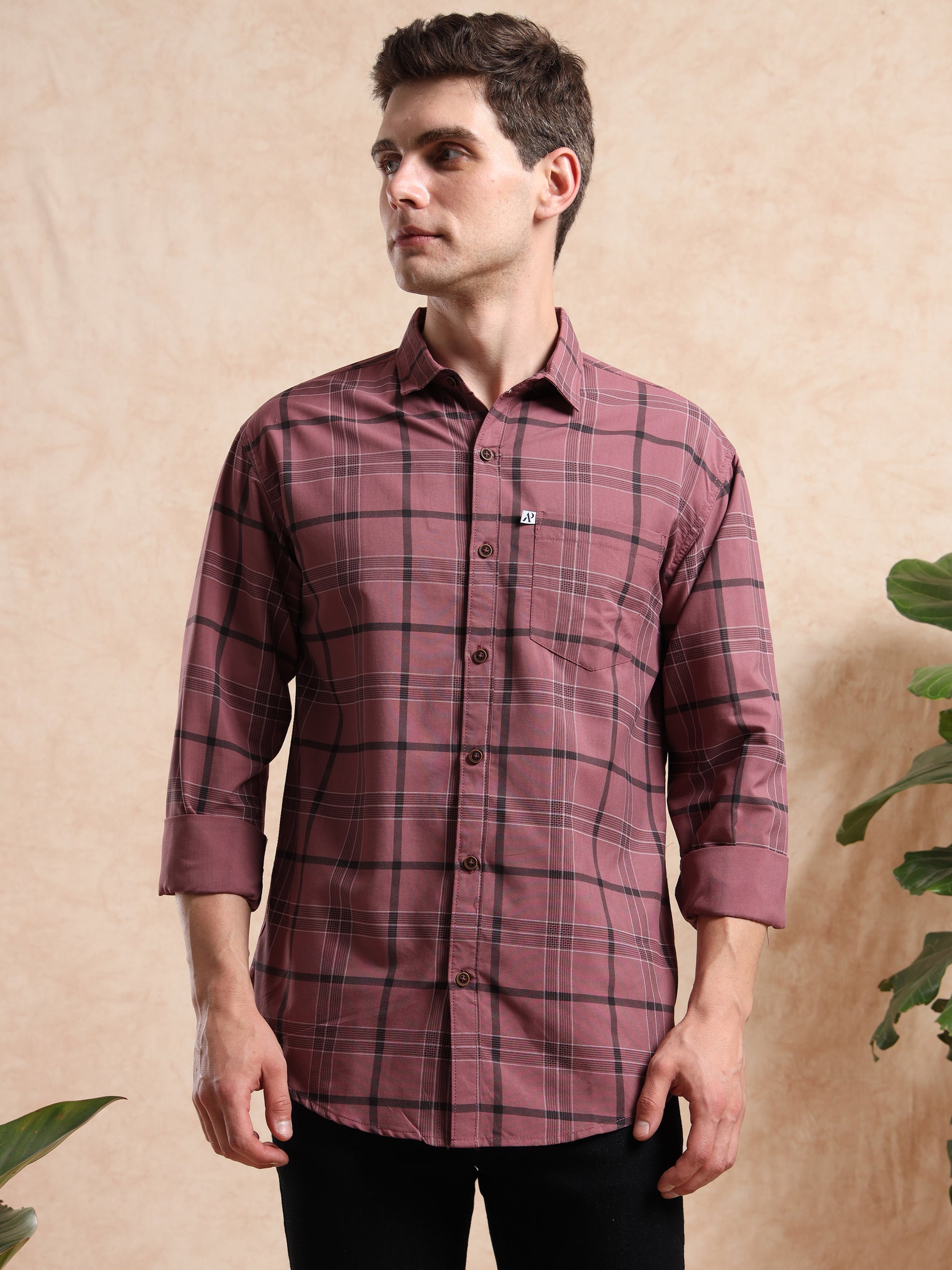 Maroon and black checkered men’s casual shirt with full sleeves, styled with a classic collar