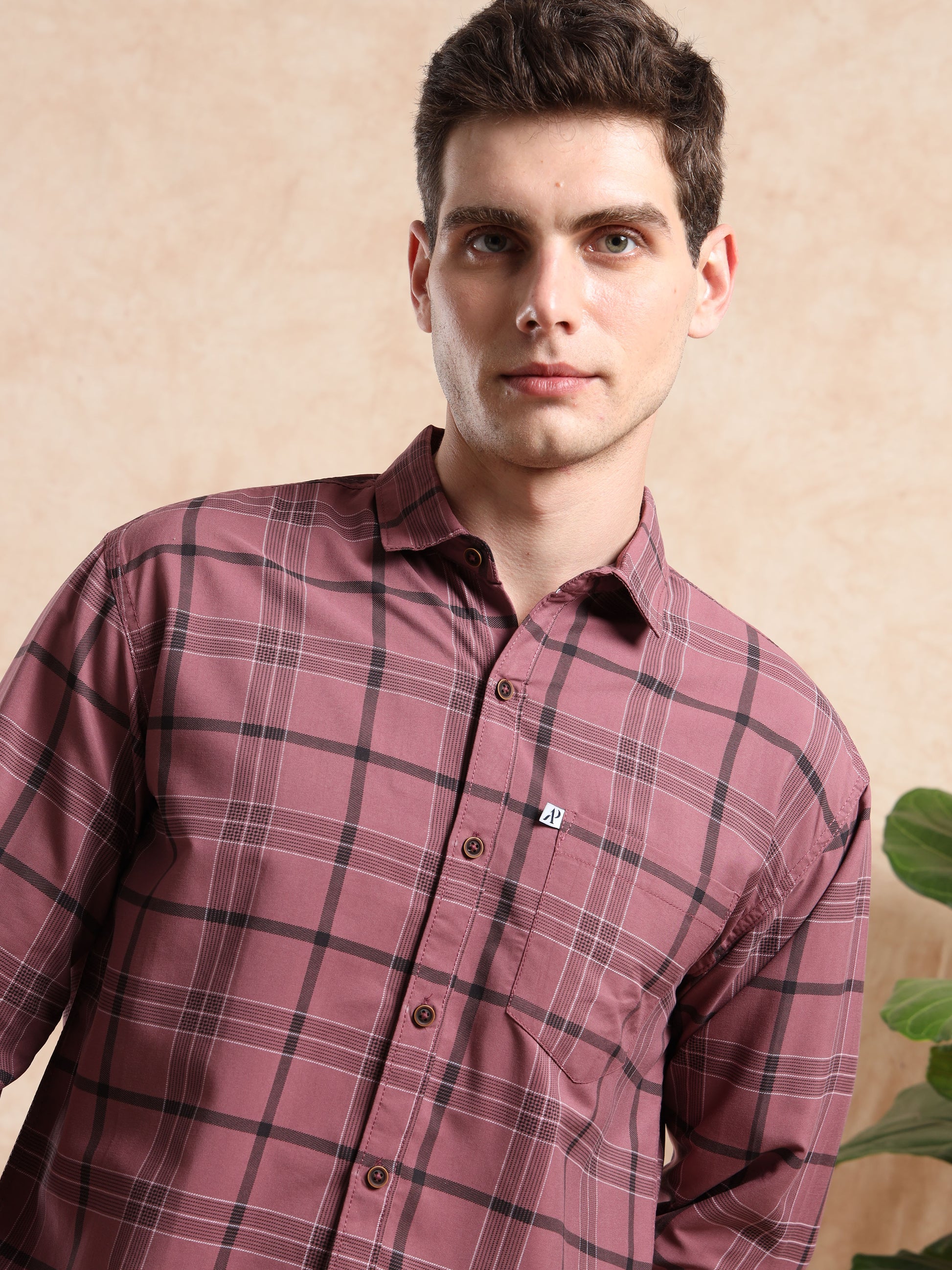 maroon and black checks shirt with button closure and chest pocket.