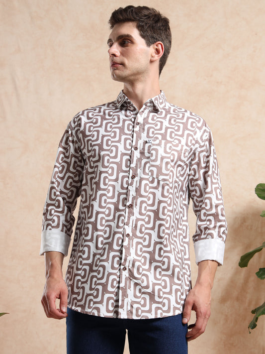Stylish full-sleeve ash grey shirt with bold geometric prints, button-down style, paired with denim jeans.