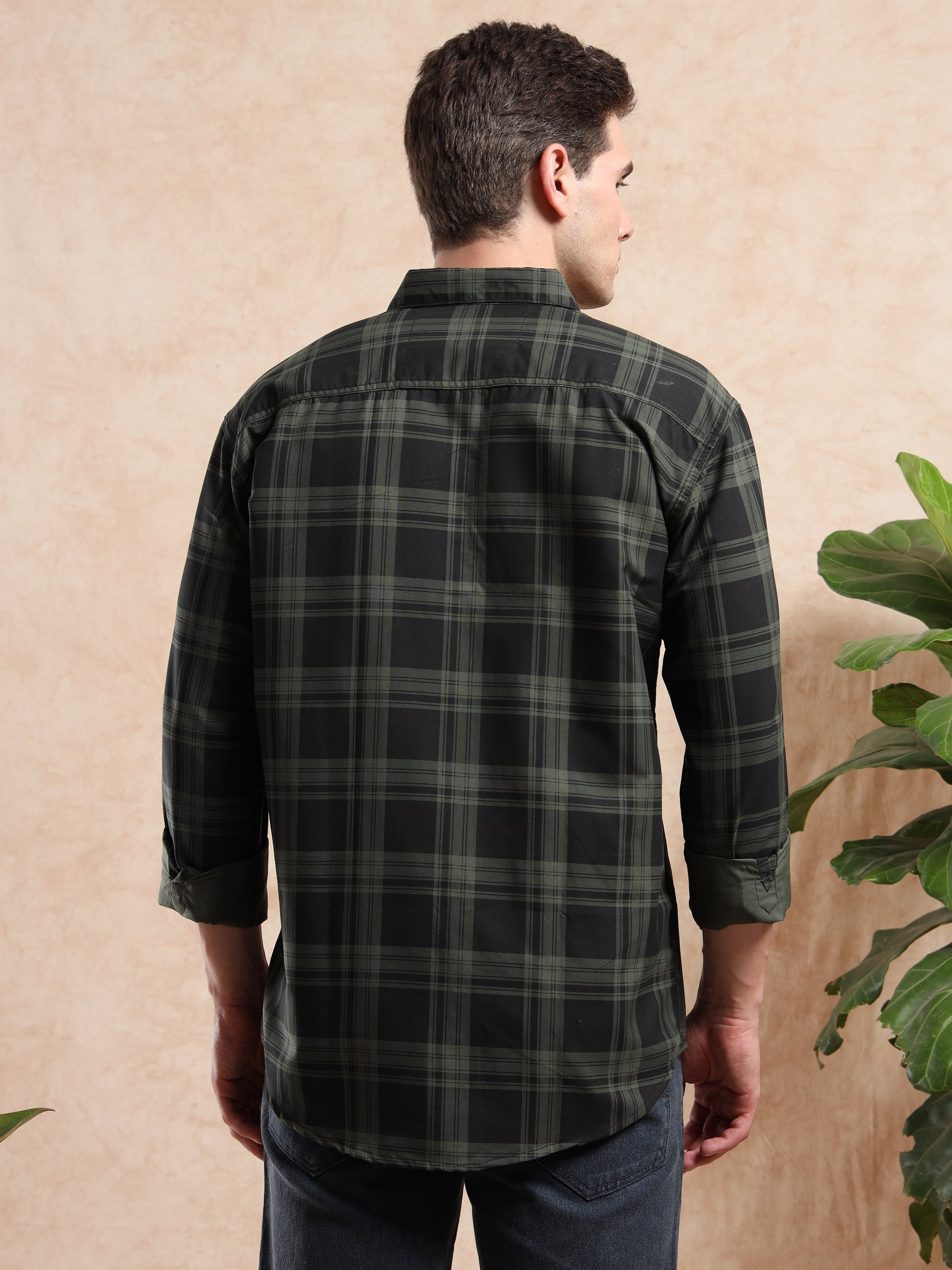men’s dark green checkered full-sleeve shirt.
