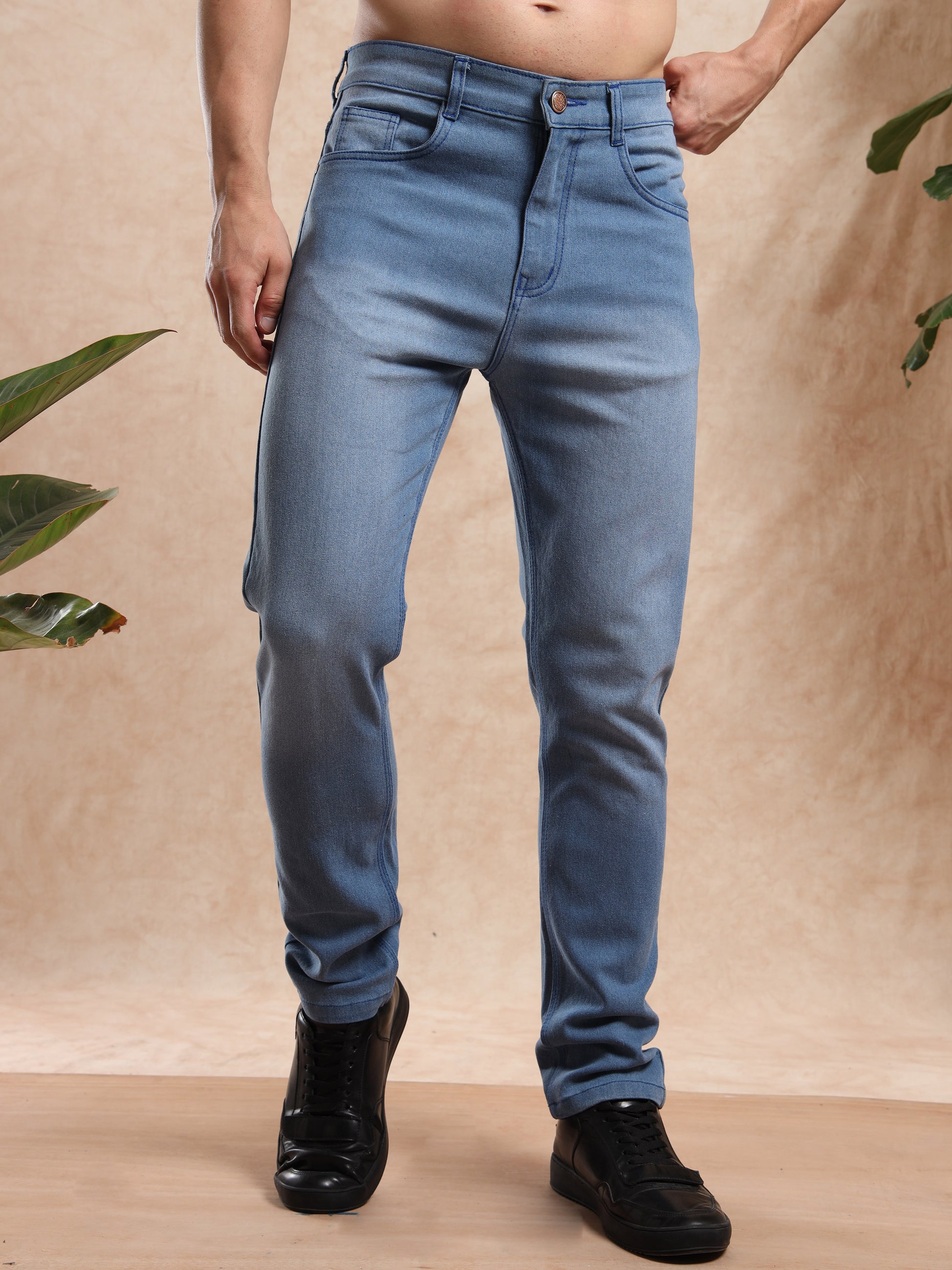 Light blue slim fit denim jeans for men with classic five-pocket design.