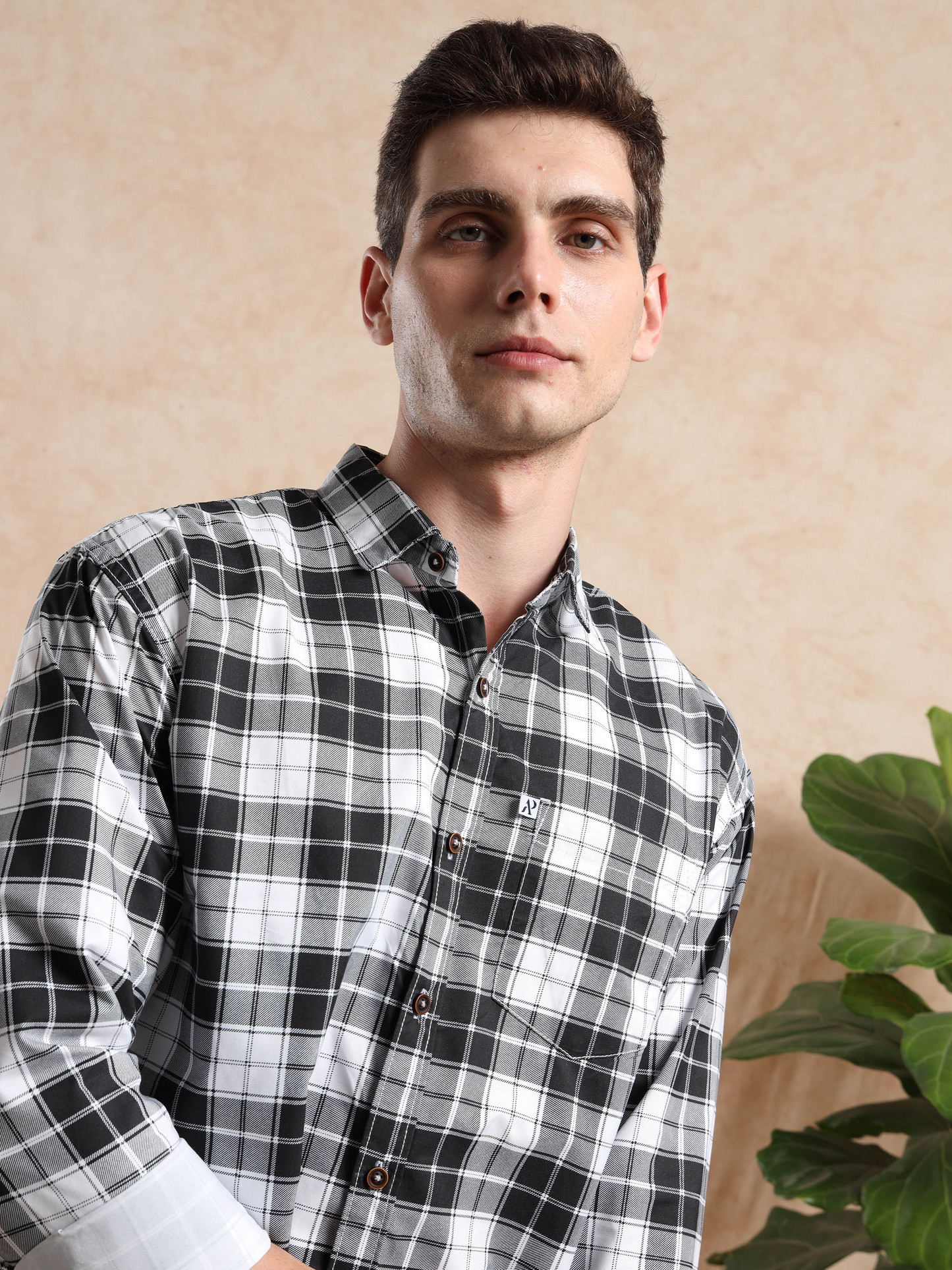 men’s black and white checked shirt with button detailing