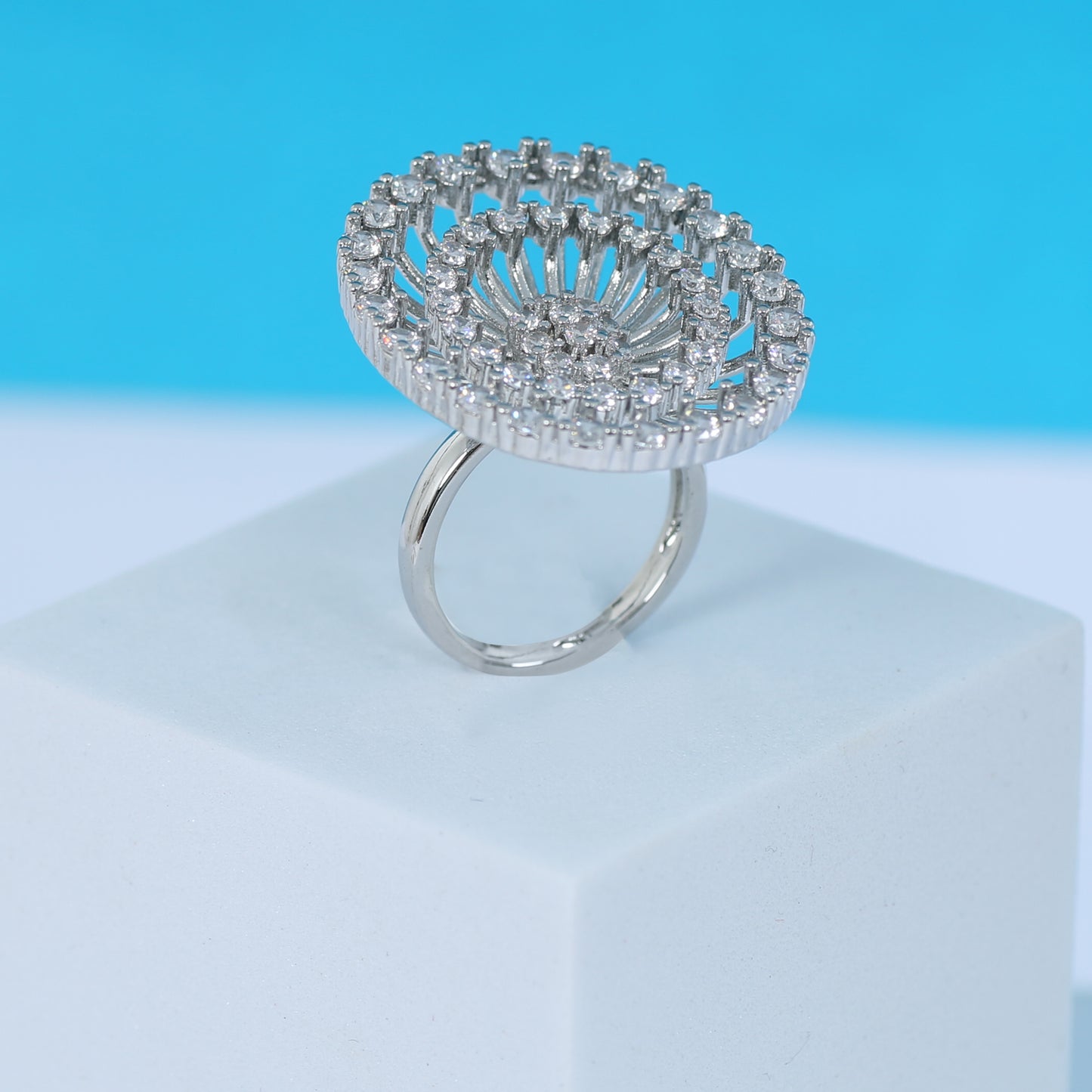 Elegant round zirconic stone cocktail ring with intricate layered design