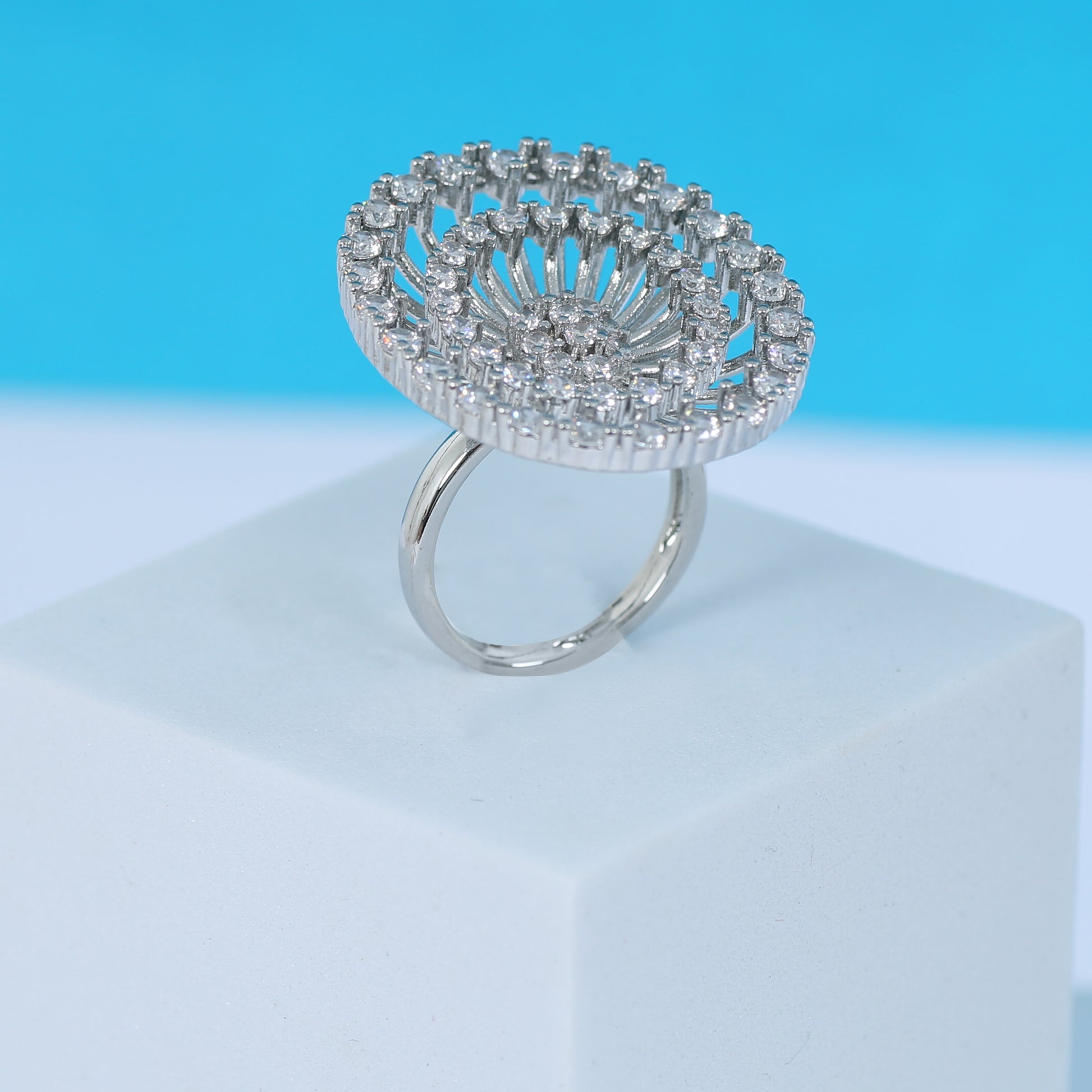 Elegant round zirconic stone cocktail ring with intricate layered design