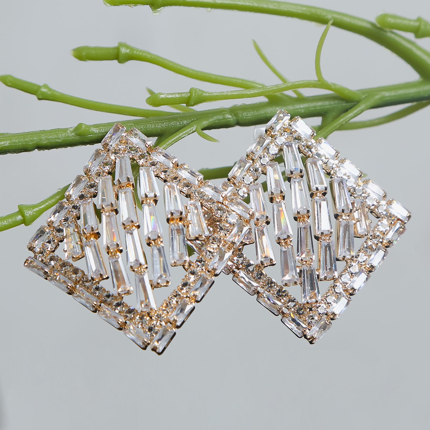Gold-plated square geometric earrings with zircon baguette stones