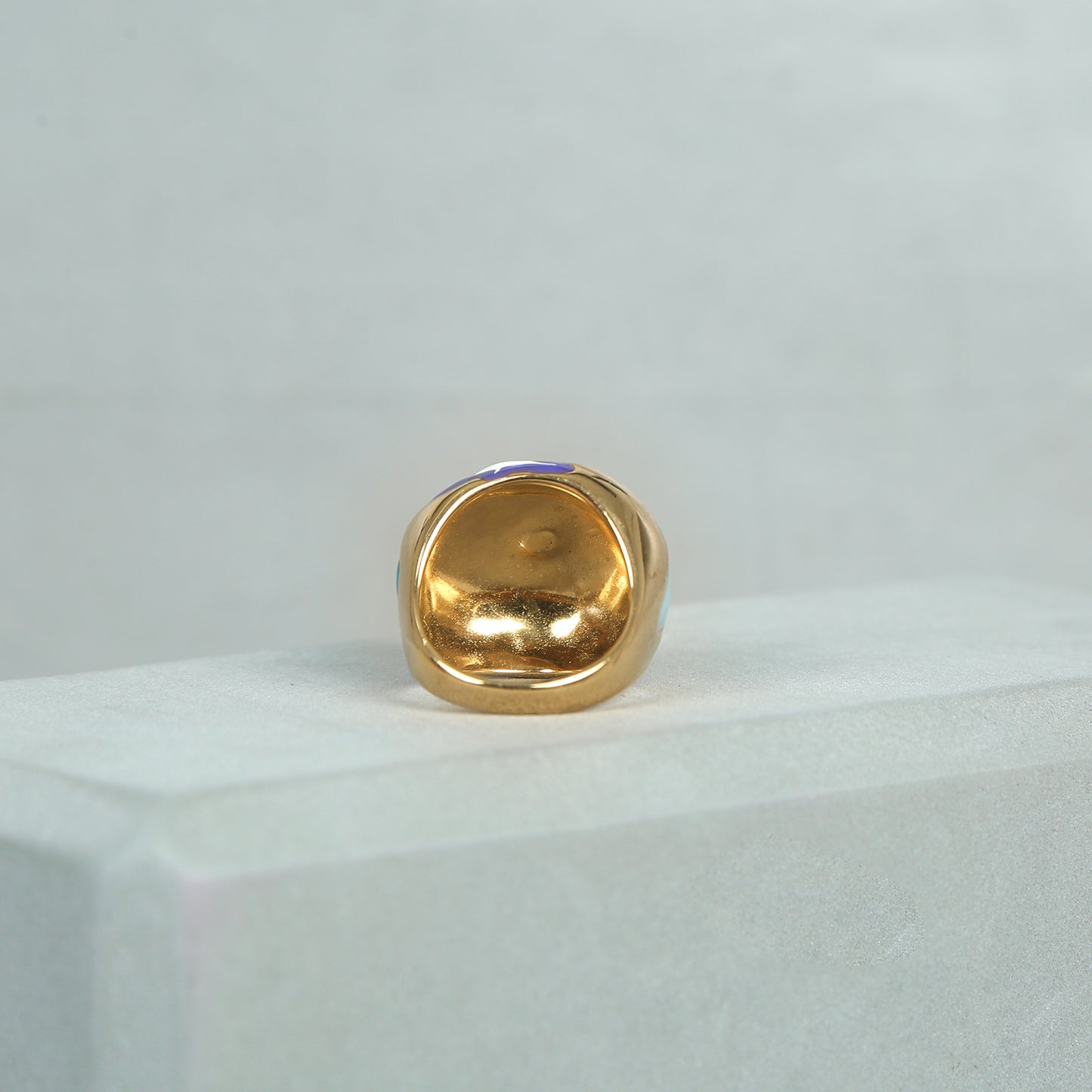 Back view of gold-plated anti-tarnish floral enamel ring showing inner smooth finish