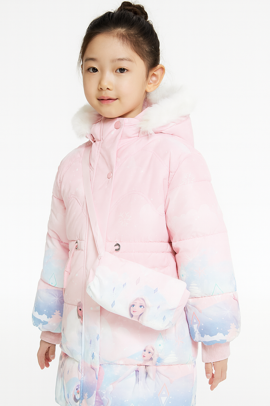 a light pink winter jacket with a white faux fur hood, featuring Frozen-themed graphics of Elsa, and carrying a matching crossbody bag