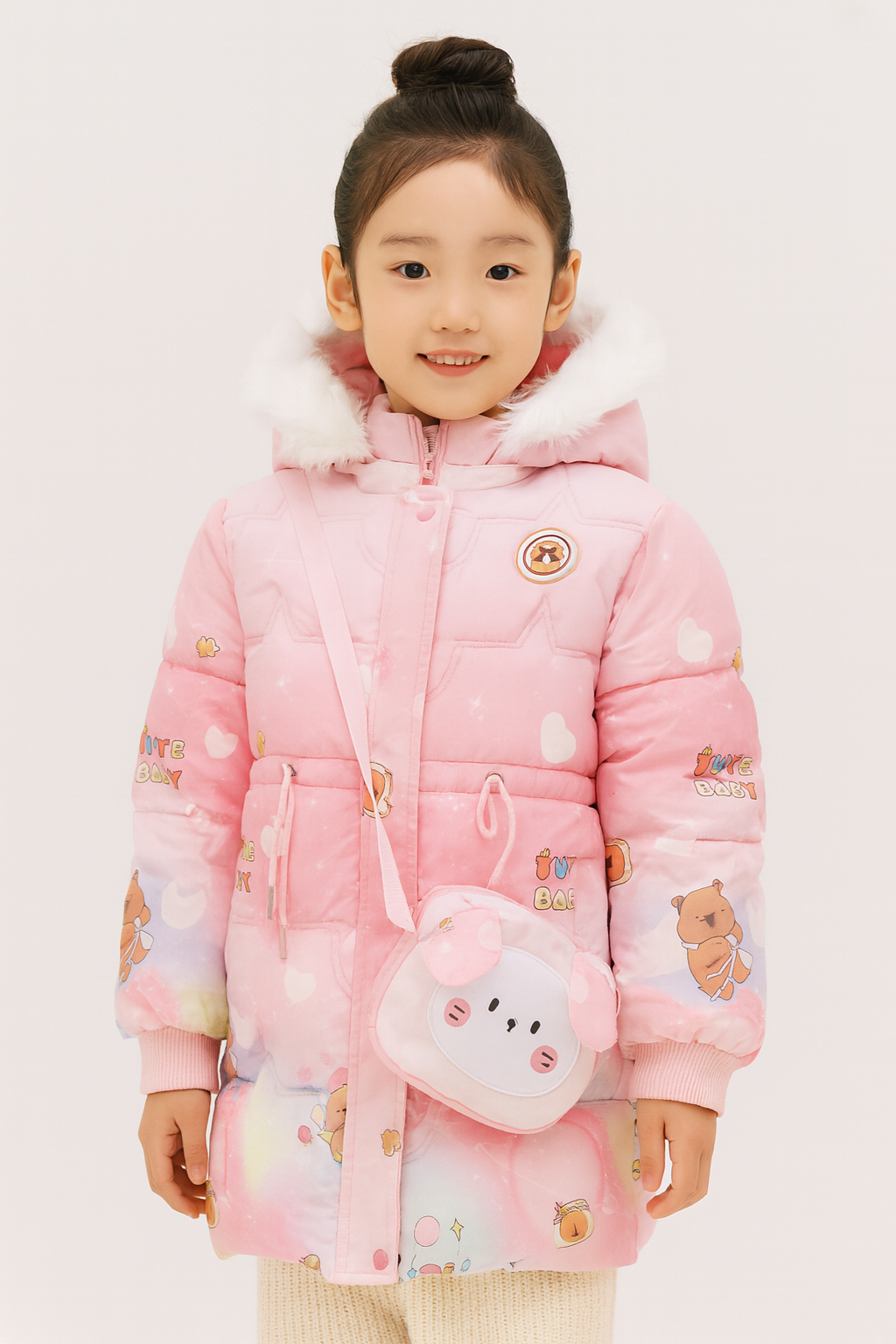 a pink winter coat with cartoon bear and heart prints, a white faux fur-lined hood, and a matching crossbody bag