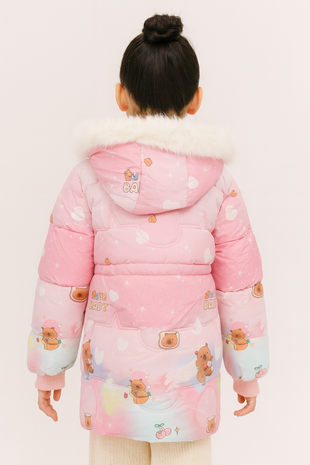 Back view of a pink winter coat with a white faux fur-lined hood, decorated with cute bear and heart prints, and colorful pastel accents.