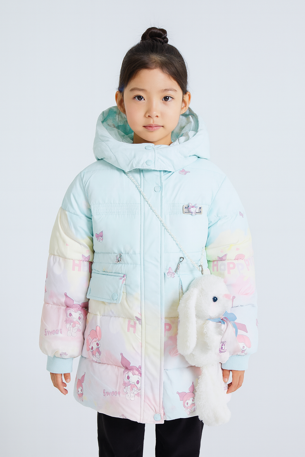 a pastel-colored puffer jacket with cartoon character prints She carries a plush white bunny bag with a blue ribbon