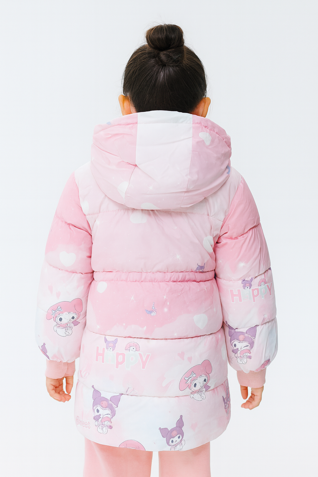 Back view of a light pink puffer jacket with My Melody and Kuromi cartoon prints, white heart patterns, and the word “HAPPY” printed on the back