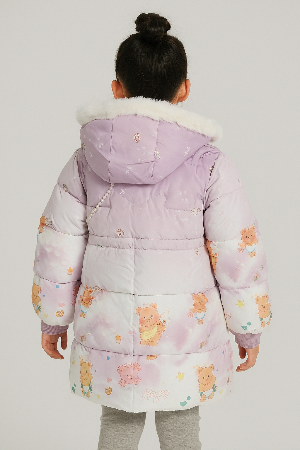 Back view of a  a light purple winter jacket for girls with white faux fur hood trim and cute teddy bear prints