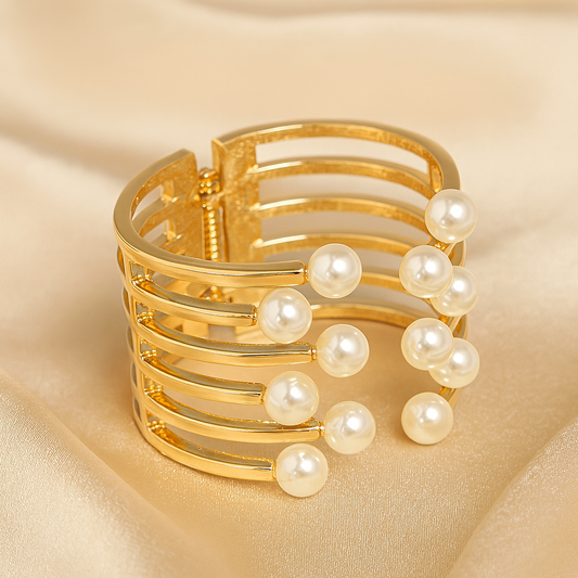 Elegant gold-plated open cuff bracelet with multiple bar layers, adorned with round imitation pearls