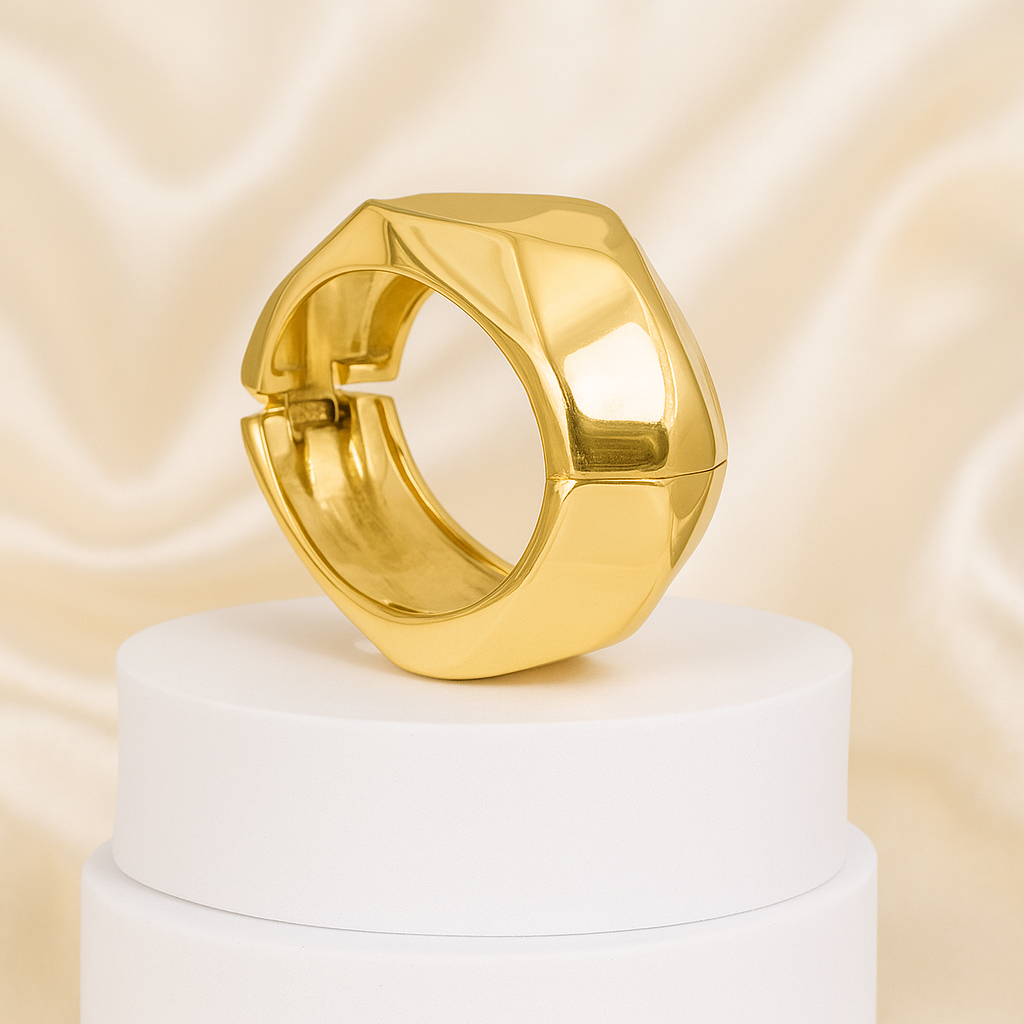 Modern gold-plated geometric cuff bracelet with a faceted design