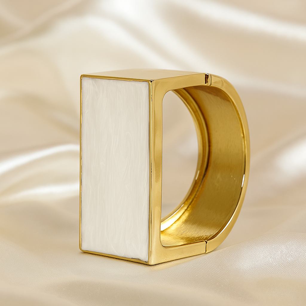 Luxury gold-plated geometric bracelet with sleek white enamel panel