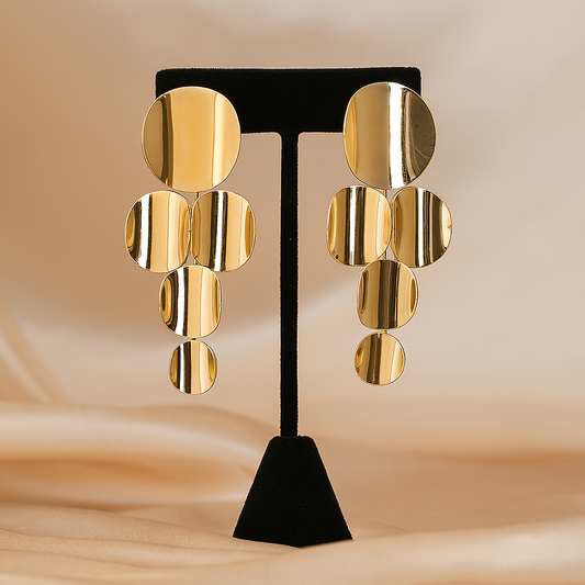 Gold statement drop earrings with geometric circular design