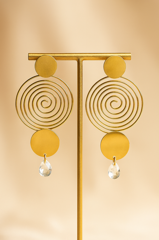 Gold spiral statement earrings with crystal drop, modern geometric dangle design