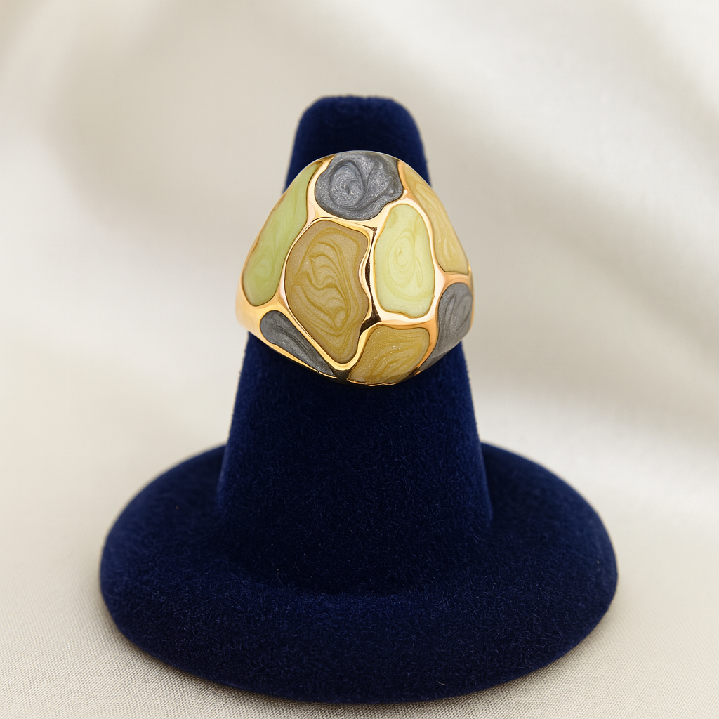 Elegant gold-plated anti-tarnish ring featuring green and grey enamel segments.