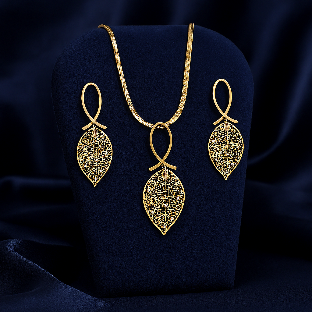 Elegant gold-plated leaf design necklace with matching drop earrings