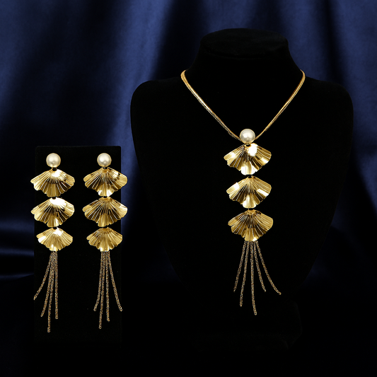 Luxurious gold fan leaf necklace with pearl accent and matching statement earrings