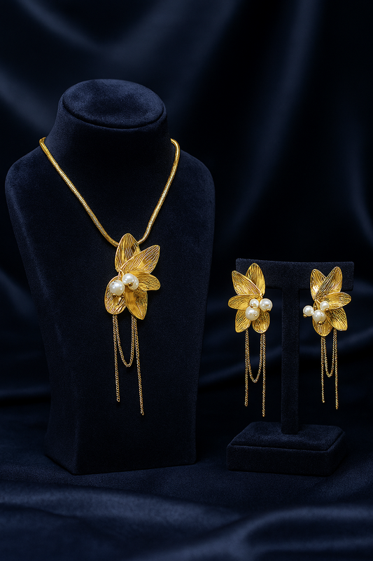 Elegant gold plated floral jewelry set with pearls and chain tassels