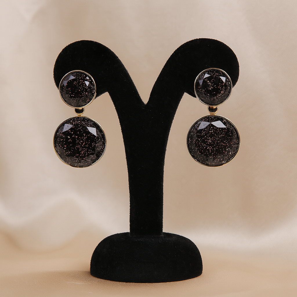 Stylish black glitter resin double round drop earrings with golden detailing