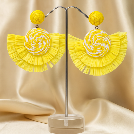 Bright yellow woven fan earrings with circular spiral design