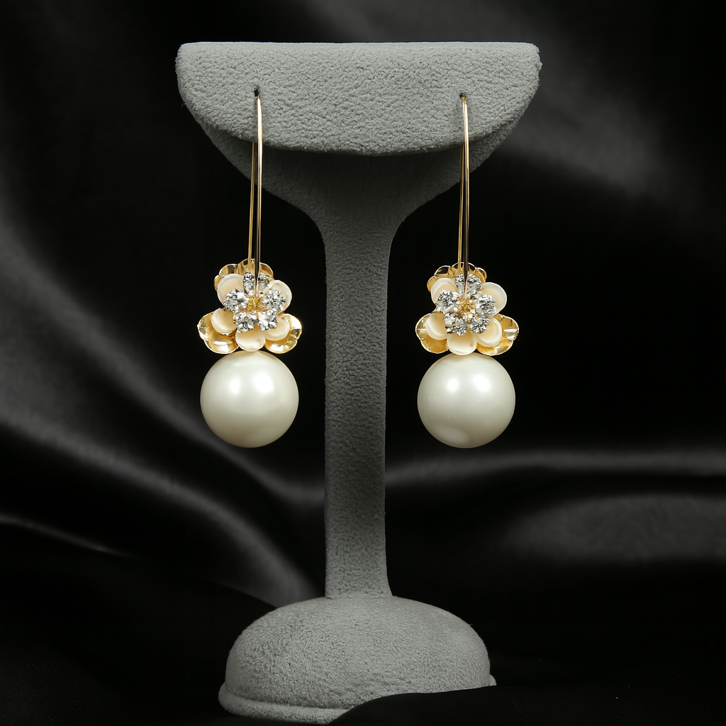 Gold floral pearl drop earrings with crystal accents