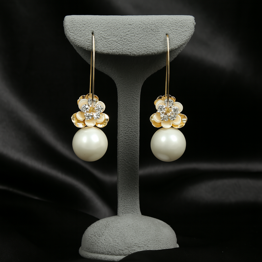 Gold floral pearl drop earrings with crystal accents