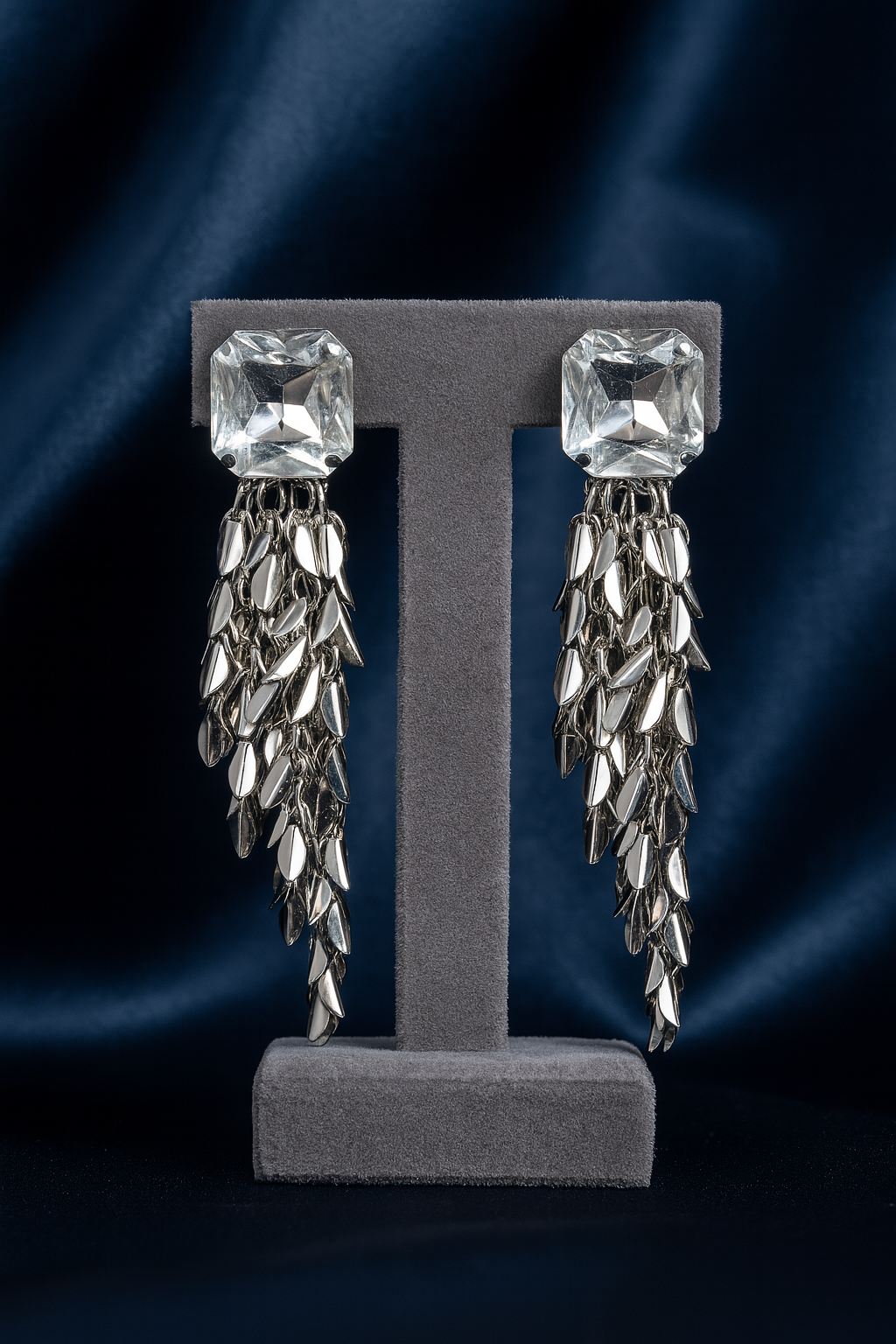 Elegant silver drop earrings featuring bold square crystal top and cascading tassel chains