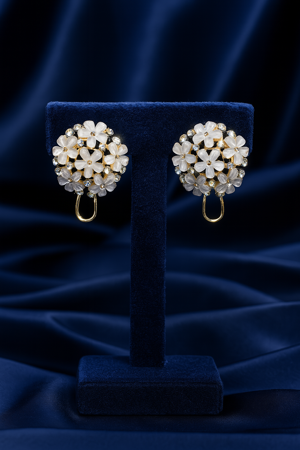 Elegant floral cluster earrings featuring white petal flowers with crystal accents