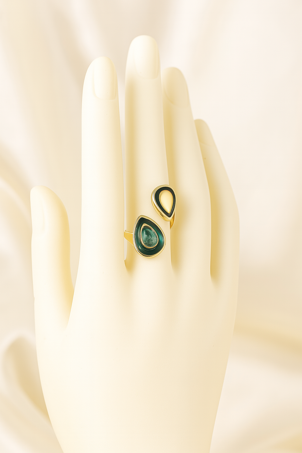 Stylish gold-plated green enamel adjustable ring showcased on a mannequin