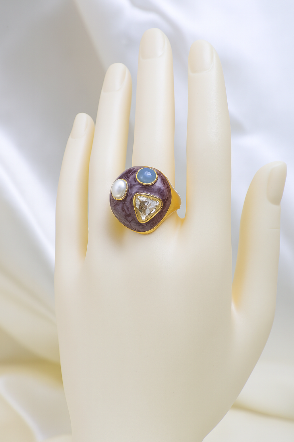Stylish maroon enamel statement ring with pearl, blue gemstone, and diamond-cut crystal