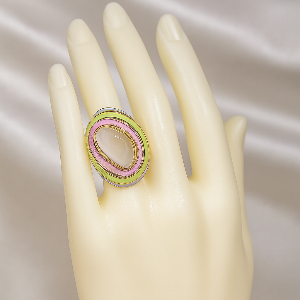 Multicolor enamel statement ring with a moonstone cabochon, showcased on a mannequin