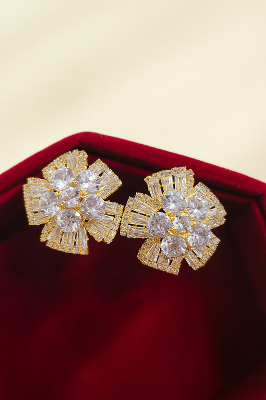 Elegant gold floral stud earrings encrusted with zircon stone