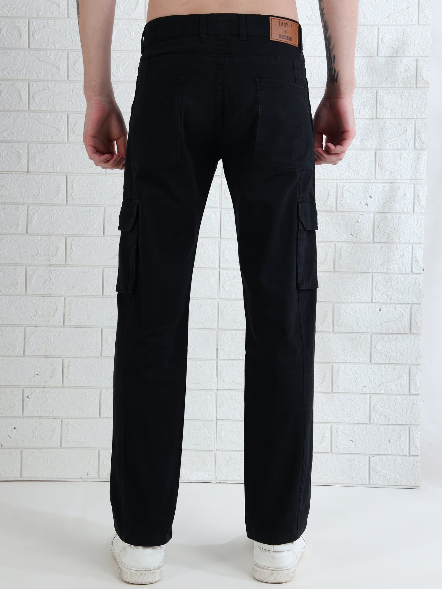 Stylish men's black cargo trousers with utility pockets and comfortable fit