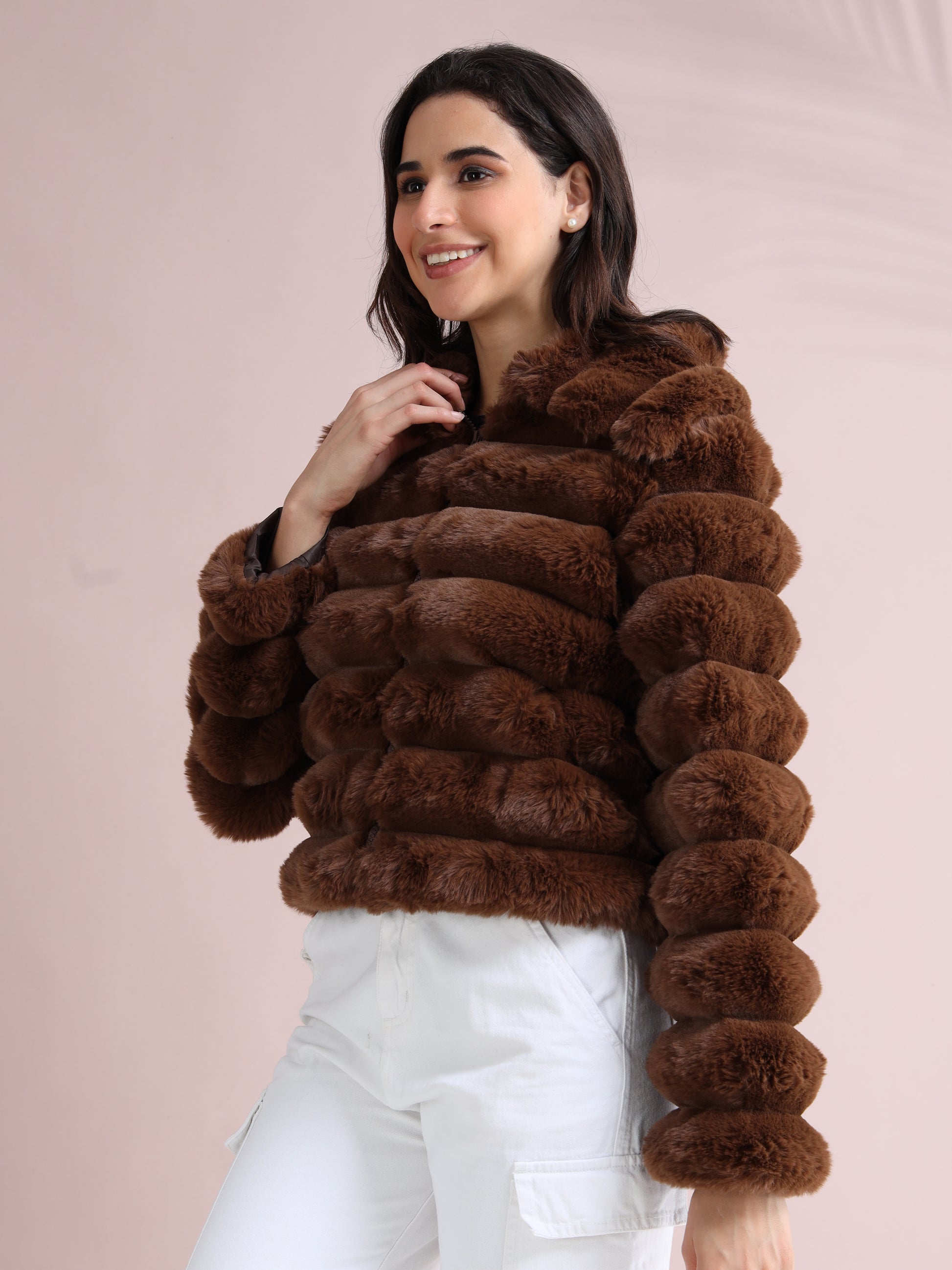 brown faux fur jacket showing soft plush texture and zipper closure