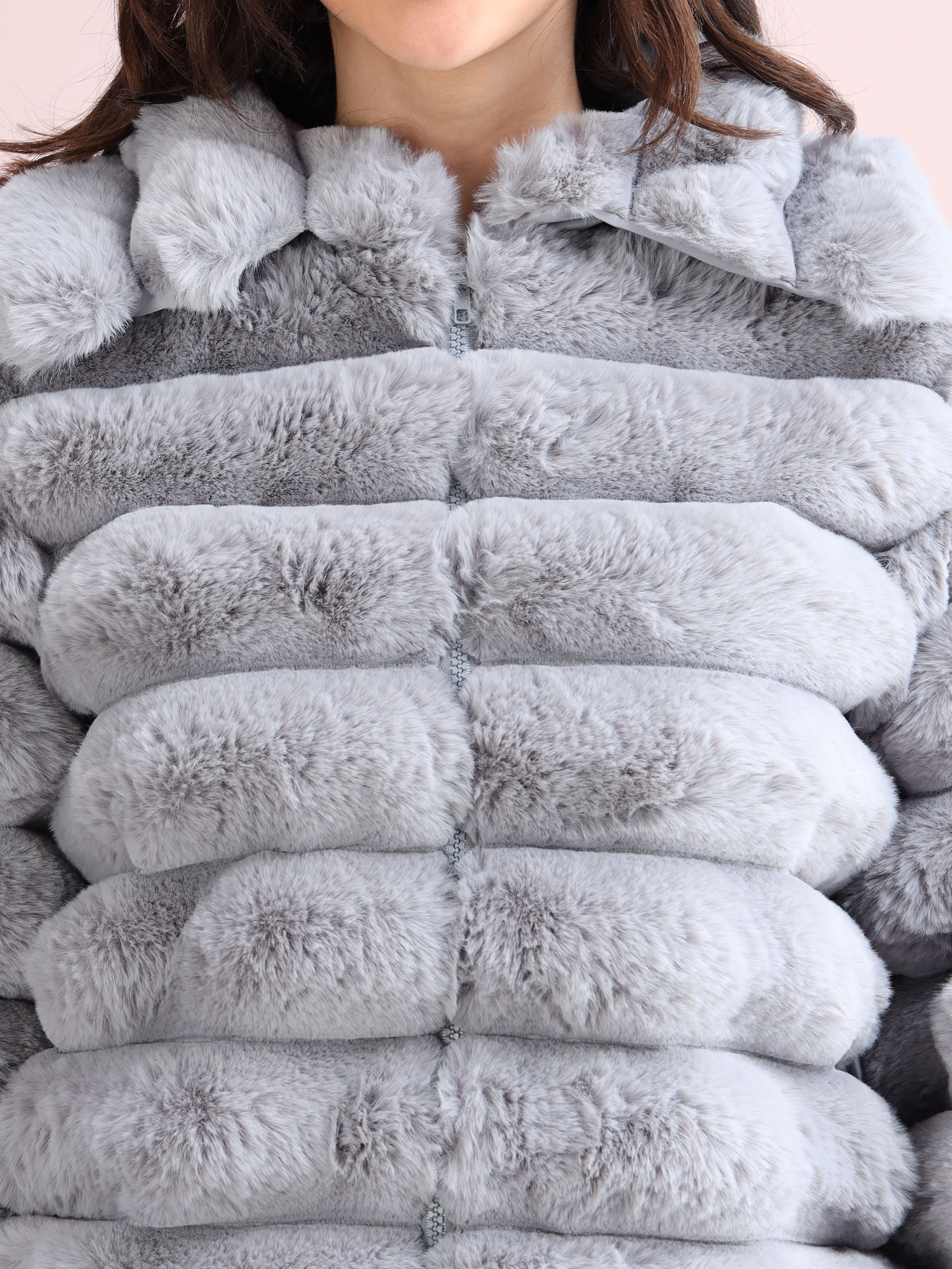 grey faux fur jacket texture and zipper closure.
