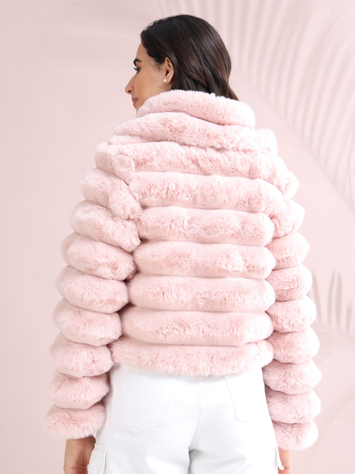 pink faux fur jacket showing plush texture and cropped fit