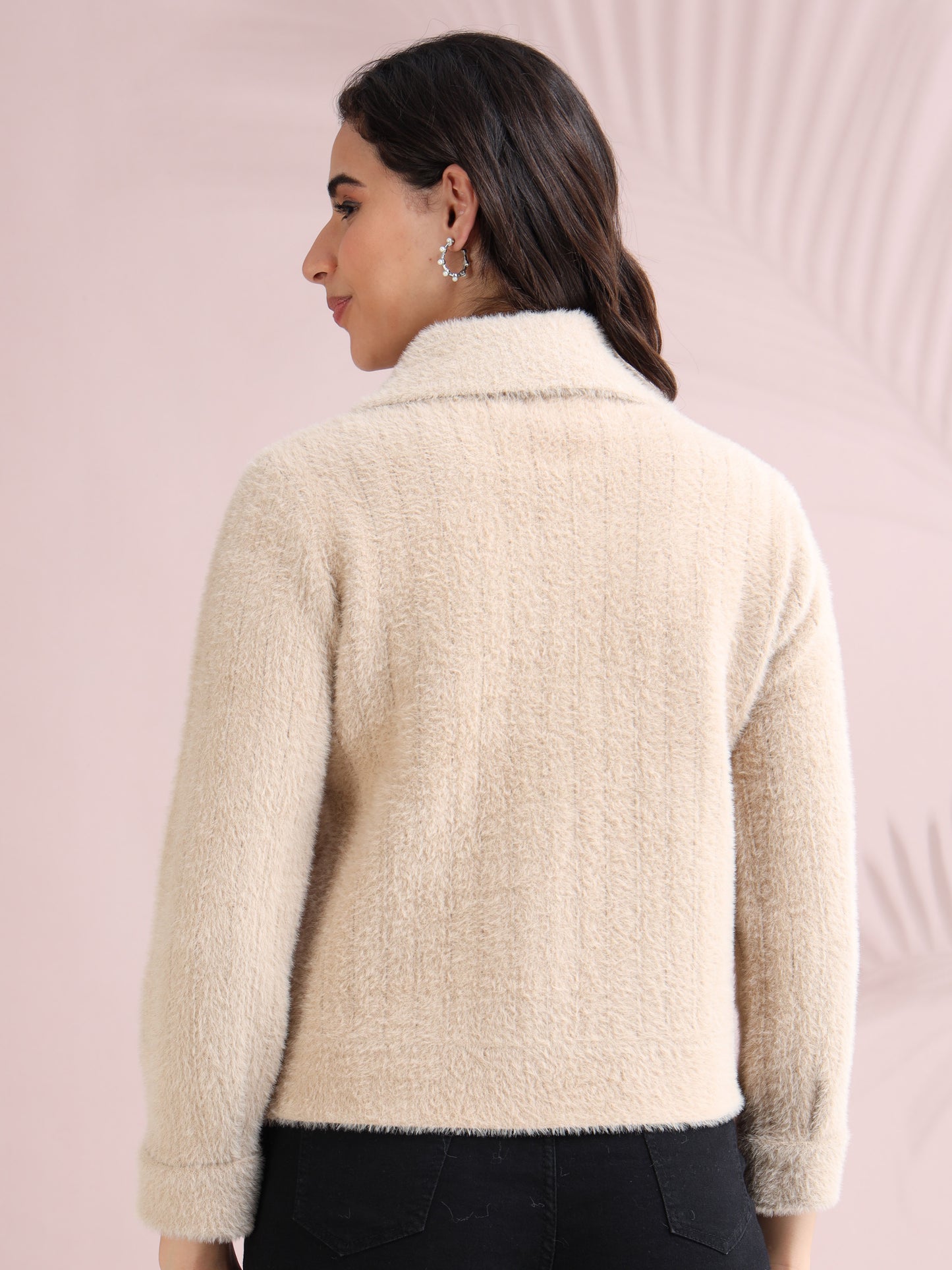 Soft beige faux fur textured women’s jacket with long sleeves, back view.