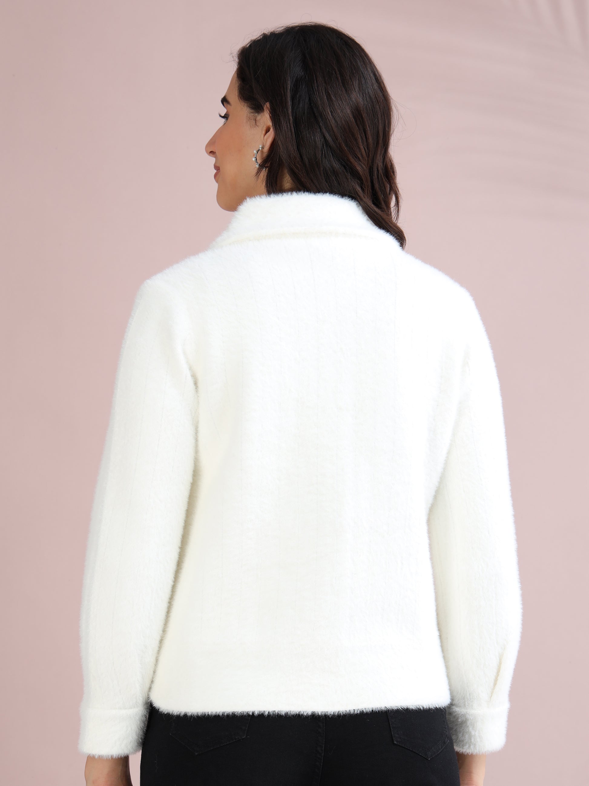 Back view of women's white winter jacket with soft textured fabric and classic collar design.