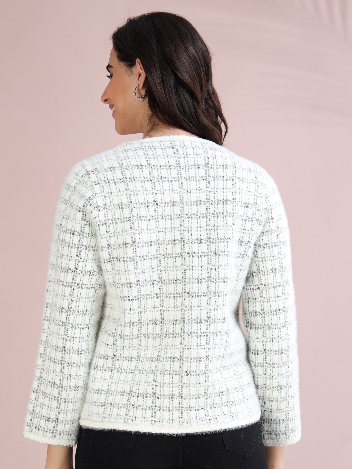 Back design of women’s tweed cardigan sweater in white with subtle check pattern.