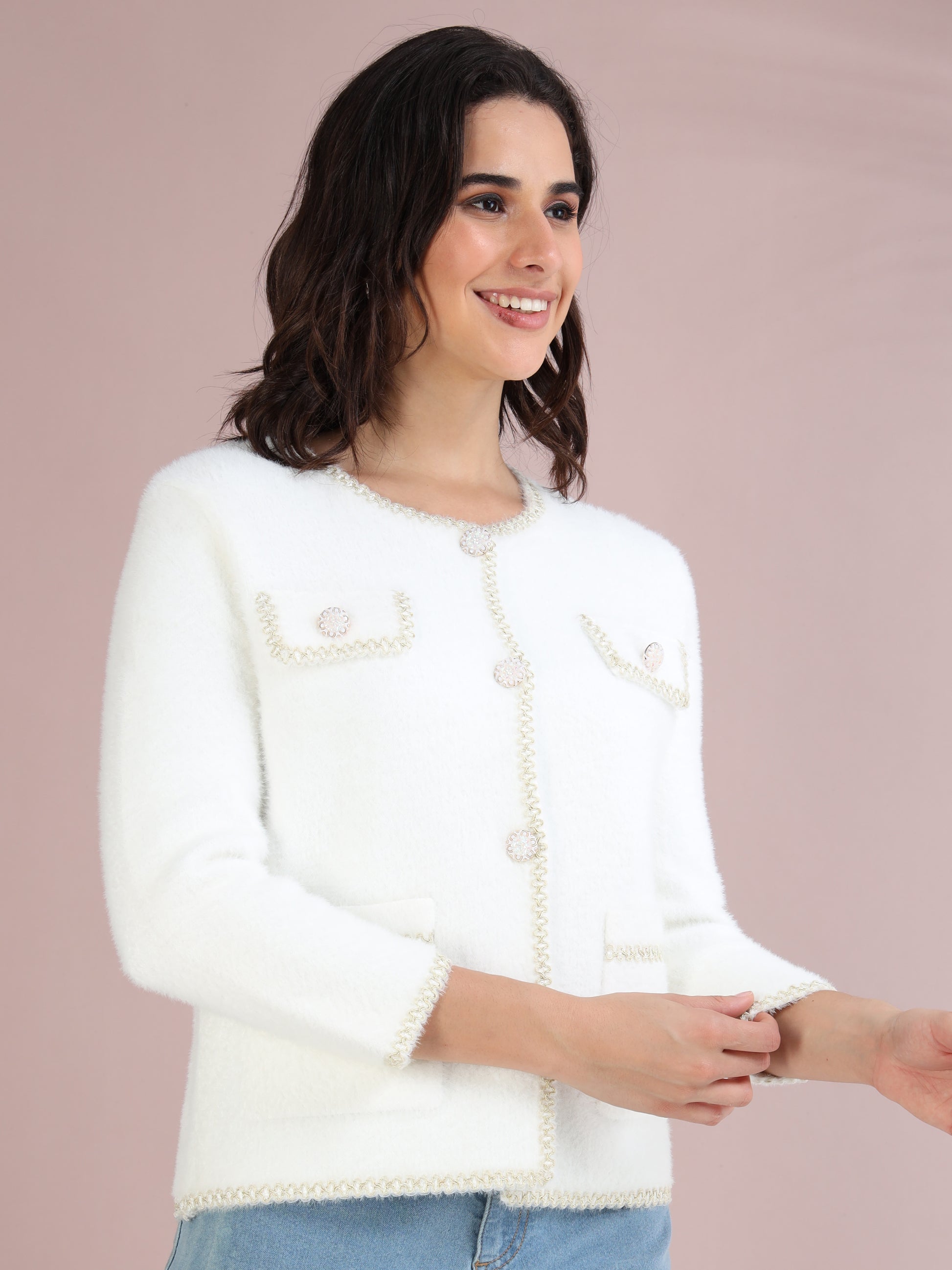 white knitted cardigan sweater for women with a clean minimal look.