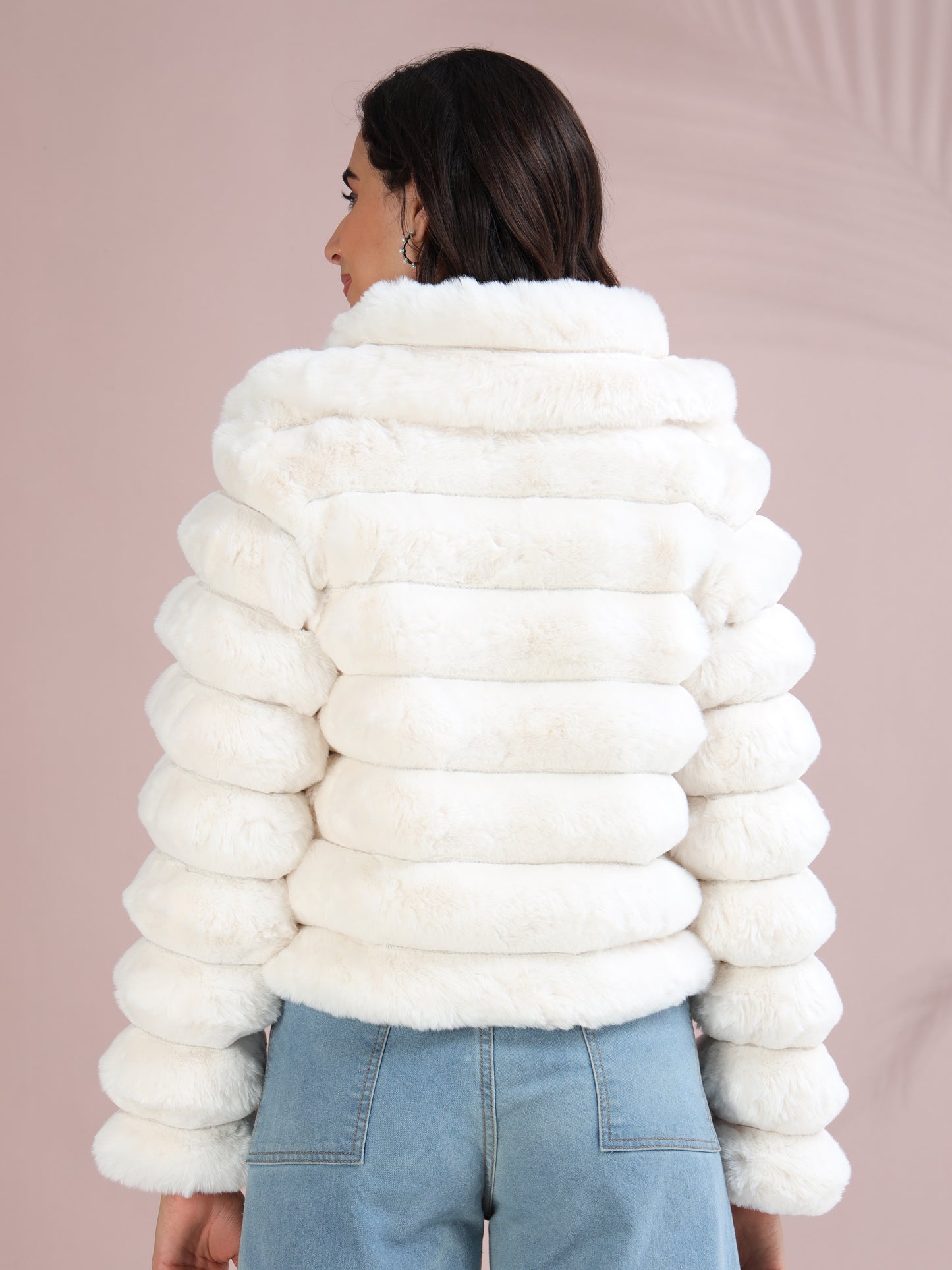 white faux fur puffer jacket showing quilted design